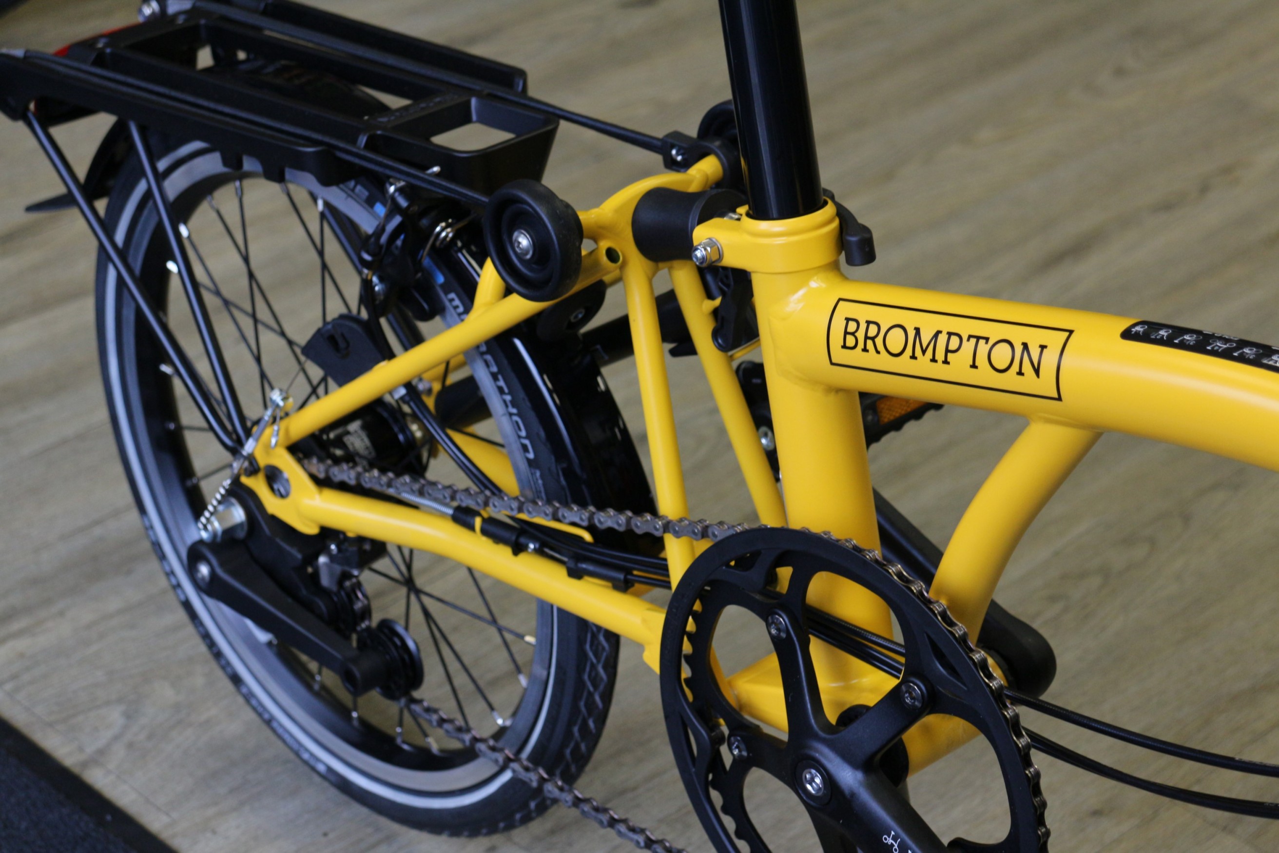 yellow brompton bike